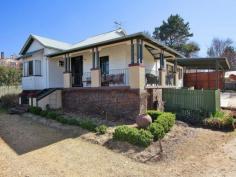 109 Kirkwood Street, Armidale, NSW 2350 This
lovely elevated home is perfectly positioned for city living. It boasts
stunning views across the city and creeklands and is just one block to
the shopping centres and coffee shops. Its close proximity to schools,
CBD, parks, clubs and sporting fields makes this a convenient family
home. Features include: Four bedrooms - all inc. built-ins and original fixtures Spacious foyer and hallway with double linen cupboard Main bathroom inc. shower, claw-foot bathtub, vanity and toilet Second bathroom off the main bedroom with shower, basin and separate toilet North facing family room with french doors opening to timber deck Modern kitchen with excellent bench and cupboard space plus dishwasher, gas cooktop and under bench oven Space saving laundry with good storage Four carports Ideal block size - 1268m2. Rates $2245 per annum Currently tenanted until Oct 2014 @ $435.00/week This
home features original polished floorboards throughout and a neutral
colourscheme. The backyard includes garden shed, rainwater tank and
mature trees. Call today to arrange your inspection.
