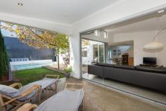 1B Cadd Street,
BEACONSFIELD WA 6162 This stunning abode has it all. Contemporary design and a modern, free
flowing layout has shaped this seamless entertaining haven. Polished
concrete flooring sets the scene, let you senses be wowed! A
modern, bright entry way leads into the open plan kitchen, dining and
sitting rooms. The kitchen has been excellently designed with family
living in mind; it has ample storage, stone bench tops and a walk in
pantry. Featuring stainless steel D'amani electric oven, gas stove, a
Miele dishwasher and plumbing connection to the fridge nook. The vast
island bench also forms a breakfast bar which can seat four. Overlooking
the sitting and dining room; you can cook dinner but still be a part of
the action. The sitting room features a high ceiling, gas point,
highlight windows and dramatic glass bi-fold doors which open out to
alfresco dining area and decking. Step out into the enchanting private
oasis where a mature plain tree provides dappled shade to the decking
and lawn. The spacious salt water swimming pool is enclosed by a modern
frameless glass fence. The polished concrete floor flows through to the
alfresco dining area which features down lights and a gas point. The
three minor bedrooms are located on the ground floor of the home and
are all spacious well sized carpeted rooms. Each room has a built in
robe with ample hanging space and shelving, a built in desk, ceiling fan
and quality louvered window treatments. The second bathroom has a large
his and hers vanity and a stunning shower over an extra deep modern
bathtub. The laundry is another example of the brilliant design
this family home offers. It has ample full length and normal storage, a
tiled splash back, plenty of bench space with provision for under bench
wash and dryer, access directly to the backyard and a separate toilet. Meander
up the light, welcoming staircase to the exquisite parents retreat. The
spacious sitting room has stunning views to Fremantle and ocean
glimpses. The master bedroom is a large bright space with a sense of
peace and tranquility. The ensuite bathroom has a roomy his and hers
rain water shower head and separate toilet. The walk in robe is large
and has ample hanging space and plenty of shelving. A home office nook
with built in desk completes leads out to the private Juliet balcony.
You can just imagine relaxing with your morning coffee while you take in
the glimpses of the ocean and enjoy the sea breeze. This family home
really does have it all! The location is outstanding, walking distance
to the expansive Hilton Park, the cafes of South Fremantle, schools and
the beach. This quiet leafy street is just far enough from the bustle of
vibrant Fremantle to be tranquil but still close enough that you can
enjoy all it has to offer. Other features include but not limited to: - Reverse cycle air conditioner in the main sitting room. - Sensor alarm system - Gas hot water system - Modern neutral colour scheme throughout home - Separate downstairs toilet - Quality louvered window treatments throughout the home - Large double car garage with additional storage and shoppers access to the home - Additional off street parking - Automated reticulation to all gardens