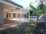 22 Kentucky Crescent OXENFORD, QLD 4210 Set on 1708m2 (approx. 1/3 of an acre) in a quiet cul-de-sac in central Oxenford, this property from the street, belies the true attributes that it has to offer. 4 extra-large bedrooms with as new modern bathrooms/ensuite, a very practical layout with 2 large separate living areas plus a substantial outdoor entertaining area that bounds two & bit sides of the house thus giving shade to those sides of the house as well. The kitchen has plenty of storage and bench space, as new dishwasher, oven & rangehood and there's plenty of room to move about. It also enjoys reverse cycle air conditioning in conjunction with the adjoining, very spacious family room. There are ceiling fans throughout the house. The modern laundry is a dream - light & bright with plenty of room for the sewing machine & table as well as heaps of cupboards. There is cool, slate floors throughout with as new carpet in the bedrooms & the formal lounge/dining area. Almost 30 squares under roof, built in 1987, this home is in very good condition.
