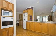 4 Petrel Pl Jacobs Well QLD 4208 Does someone in your home need their own space? Here is a possible solution which may help keep the family together. Substantial
family home in secure well maintained setting, plus independent self
contained accommodation. 3 x living areas, generous sized bedrooms,
Tassie oak kitchen, spa to ensuite , and solar electricity are just a
taste of the many features this private home has to offer. Great size
fully fenced 830sqm block. Life in Jacobs well has plenty on offer,
Situated near the mouth of the Pimpama River on the edge of a pristine
waterway peppered with uninhabited islands, Jacobs Well is a haven for
fishermen and boat enthusiasts alike. This quaint fishing
village, with lovely water views, is situated approximately halfway
between the cities of Brisbane and the Gold Coast. It can be found 10
minutes off the Pacific Highway after a short drive through scenic
fields of sugarcane. As the gateway to southern Moreton Bay,
Jacobs Well is just a short boat ride to the Gold Coast Broadwater and
the tourist Mecca of Southport. The area is an ideal launch site to
access the islands and channels of the Jumpinpin area, well-known for
its ideal fishing and boating conditions. Boaties will enjoy exploring
the myriad of islands in the coastal channel and there are no bridges or
obstacles or to spoil the fun! Fisherman will find nearby estuary
waters teeming with flathead, whiting, tailor, and bream. Reel them in
from the jetty or over the side of a boat. Features Fenced Smoke Alarms Granny flat Safety Switch