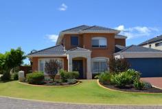 2 Parish Ln Churchlands WA 6018 Located only a few metres from picturesque Herdsman Lake and wildlife reserve
within whisper quiet Floreat Lakes Estate this immaculate two storey family home
offers a relaxed "country lifestyle" in a very convenient location surrounded by
an abundance of nearby public amenities, glorious coastline and the city centre.
For further details or to view this lovely home please call IAN FATHARLY
on 0411 886 183. ACCOMMODATION AND FEATURES First
Floor *Covered front porch and double door front entry opening into double
height reception foyer with gleaming polished floorboards *Formal
lounge/sitting room *Large formal dining room/study or theatre
room *Spacious open plan family room/meals and kitchen with sliding external
doors opening onto the alfresco area *Country style kitchen with gas
hotplates, under counter oven, large fridge recess, pantry and Miele
dishwasher *Separate laundry...