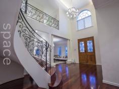 GRAND GEORGIAN MANOR, HUGE LEVEL CORNER SITE, FOOTSTEPS TO BEACH GRAND GEORGIAN MANOR HUGE LEVEL CORNER SITE FOOTSTEPS TO BEACH... ABSOLUTELY ALL OFFERS PRESENTED BY 5PM 10TH SEPTEMBER 2014. (SELLER RESERVES THE RIGHT TO SELL PRIOR). WILL BE SOLD. Set
amongst classical gardens and with a traditional faade combining
elements of an elegant London city residence or even a southern American
plantation home, you will fall in love with the excess, the opulence
and the sheer presence of this amazing home. Near new, the home
was built by master builders Oswald Homes, and consists of an
extraordinarily large 680sqm of built-form (approx) on a huge level
992sqm corner site, only footsteps to the beach. Imposing rustic
timber and wrought iron doors greet you on entry and welcome you to the
palatial formal entry, featuring a mesmerizing Gone with the Wind
sweeping stairwell and a large central chandelier in the second floor
void. A home office off the entry allows you to greet clients without
disturbing the family. Opposite are the huge formal lounge and formal
dining, with ancient and irreplaceable 6 jarrah floorboards steeped with
character. This formal drawing room has a cool, modern, decadent edge.
It is one ... show more View Sold Properties for this Location View Auction Results General Features Property Type: House Bedrooms: 5 Bathrooms: 4 Land Size: 992 m² (approx) Indoor Features Toilets: 4 Alarm System Air Conditioning