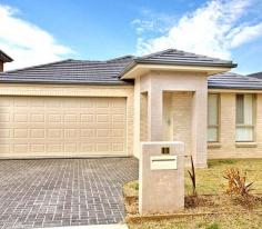 Middleton Grange NSW, 2171 * 4 bedroom brick veneer home with double lock up garage * Home offers two living areas, open plan kitchen, family meals area & alfresco * Spacious bedrooms with built ins & walk in robe to main * Inclusions consists of ducted A/C, gas cooking, stone bench tops & remote garage * Located close to playground, pool & tennis court