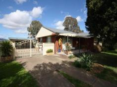 142 Segenhoe Road Aberdeen NSW 2336 A home among the Gum Trees! This is the perfect "farm" you get the advantage of 360 degree views of lush green paddocks that someone else tends to. Situated on 1 acre on picturesque Segenhoe Road, half way between Aberdeen & Scone is this 4 bedroom brick property. The main house has a large loungeroom with gas heating, gorgeous modern kitchen, dining and an extra TV/Rumpus room with split system A/C and underfloor heating. The bedrooms are all spacious and have built in robes and ceiling fans. The main bathroom has that country feel with a large bath and separate shower. There is added storage in the hall with two more sets of built in robes. The fourth bedroom is seperate from the main house and can be used for a parents retreat, granny flat or just a great spot for visitors, it includes a large loungeroom with A/C, kitchen, bedroom, walk in robe and a 2nd toilet. There is provision for a full bathroom to be installed if needed. Other infrastructure includes a 4 bay shed with mezzanine storage (13m x 7m with 6m awning), garden sheds, fencing, fruit trees, double carport and a fully equipped Well. Book your inspection today!