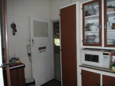 31-33 Quartermaine Street, DALBEG QLD 4807 3 Bedroom Cladded Home with 2 x 874 m2 Allotments & Large Shed situated at Dalbeg approx. 90 klms from Ayr. Home has 3 Bedrooms, airconditioning to living areas, & Bedrooms, Older style timber kitchen, Bathroom with Bathtub, Shower & toilet, downstairs 3.3m x 12m lean-to area with laundry GARAGE there is a fully enclosed double bay garage with carport & Large Shed 12m x 9m Timber Frame Shed both with power & lighting, Bitumen road frontage & town water in is connected. There is also 7m x 2.5m x 3m fully sealed external office/bedroom included in the sale. School bus stop at front of house for primary & secondary schools. For more info please contact agent. To view other properties from this agent please see website
