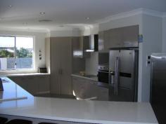 5-7 Blueberry Street Banksia Beach Qld 4507 OLF COURSE ESTATE QUALITY LIVING BELOW BUILD COST This four bedroom golf course estate property is a must to view. The property offers huge side access for caravan, boat or trailer and room for a pool. Add to this ducted air conditioning, media room, all bedrooms are large with built ins and 9 feet ceilings throughout. Outdoors entertain on your large timber entertainment deck.