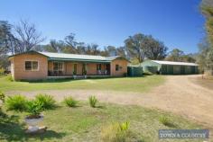 13 stringy bark ridge road armidale This lovely elevated home
is perfectly positioned for city living. It boasts stunning views
across the city and creeklands and is just one block to the shopping
centres and coffee shops. Its close proximity to schools, CBD, parks,
clubs and sporting fields makes this a convenient family home. Features include: Four bedrooms - all inc. built-ins and original fixtures Spacious foyer and hallway with double linen cupboard Main bathroom inc. shower, claw-foot bathtub, vanity and toilet Second bathroom off the main bedroom with shower, basin and separate toilet North facing family room with french doors opening to timber deck Modern kitchen with excellent bench and cupboard space plus dishwasher, gas cooktop and under bench oven Space saving laundry with good storage Four carports Ideal block size - 1268m2. Rates $2245 per annum Currently tenanted until Oct 2014 @ $435.00/week This
home features original polished floorboards throughout and a neutral
colourscheme. The backyard includes garden shed, rainwater tank and
mature trees.