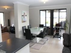 Awesome Rear Living! Feast your eyes on this different design - all the living areas are at the rear of the home to take advantage of family indoor/outdoor living. The main bedroom suite is huge with a great ensuite and walk-in-robe. The 3 minor bedrooms all have built in robes and have an activity room between them. Great for the kids to take over! The spacious open living area is kept cosy with a wood heater and has the well appointed kitchen as its hub. Off this area is the separate theatre/lounge room. The home has ducted evaporative air conditioning through and great decor to suite all tastes. Outside is a wonderful gabled patio that overlooks lush reticulated lawns and gardens, plus a small garden shed. Drive straight through the double garage for access to the backyard. There's also extra parking on the front verge. This home is in a great location and only a short walk or ride to Kingston Primary. Be quick to view this easy care family home! Call Darryl Helms at DAD Realty to book an inspection.