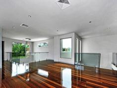 1012 Edgecliff Drive Sanctuary Cove Qld 4212
For Sale
Stunning modern home - Executive home with study near front entrance.
Features Include:
* Cathedral ceilings
* Media room fully equipped
* 4 en-suited bedrooms will robes
* Separate powder room
* Polished timber floors
* High glass windows and doors open onto outdoor entertaining patio
* Kitchen with granite benches and butler's pantry
* 2 Master bedrooms - one downstairs and one upstairs
* Huge open plan living, dining and family area
* Glass balustrade to upper level with amazing staircase
* 3 bedrooms upstairs
* Master with lovely en-suite and balcony
* Large games room
* Pontoon and close to main river
* Entertaining area with sauna and covered built in BBQ area
Sanctuary Cove has been awarded Australia's first Five Gold Anchor
Residential Canal Estate Marine accreditation - one of only two such
accolades in the world.
THE ULTIMATE LIFESTYLE – THE BEST RESIDENTIAL RESORT IN AUSTRALIA – AN ENVIABLE REPUTATION
When buying a home in Sanctuary Cove it is not like buying a home
anywhere else. There are no comparable locations on the Gold Coast, if
not Australia. It will never be replicated. It is buying a LIFESTYLE and
a way of life that is the envy of everyone. There is a whole community
behind the gates – you can walk, ride your bike or take a buggy. Amuse
yourself the whole weekend without even leaving the resort.
Sanctuary Cove is a resort-style master planned community featuring
two 18 hole championship golf courses, a 300 berth marine, Hyatt Regency
(with exclusive use by all residents) and Country Club. There is no
other place that offers such a safe, peaceful, wonderful and ultimate
lifestyle for all ages.
The very nature of Sanctuary Cove and the wonderful friendly
community spirit provides residents with the ultimate lifestyle. There
is more to the Cove than in these notes, including special travel
arrangements for school children, bus services, mobile library, twice
weekly rubbish collections even with bins deodorized, lined and returned
to your property, garden and street maintenance, postal and news
deliveries, even PETS ARE WELCOME.
SECURITY
Sanctuary Cove offers its residents 24 hour active land and water
‘back to base’ security services providing the peace of mind we are all
striving for. All security personnel are CPR qualified.
INTERNATIONALLY RENOWNED GOLF COURSES & COUNTRY CLUB
The Pines Golf Course and the newly renovated Palms Golf Course
offer contrasting styles and premier design and are widely regarded
among Australia’s elite players. The absolute ultimate for any golfer,
plus of course all the excellent associated facilities, professional
tuition, pro shop, driving range, putting greens and a magnificent
environment in the new $13 million dollar Country Club which also offers
a full fitness centre, tennis courts and a 25 metre swimming pool,
beauty treatments and massage rooms.
MARINE VILLAGE
As short buggy ride away is The Marine Village – the heart of
Sanctuary Cove - located on the edge of a tranquil harbour it is home to
a variety of cafes, bars, restaurants, Yacht Club, medical centre,
dentist, lawyer, pharmacy, bank, newsagents and specialty shops.
SANCTUARY COVE MARINA
The Marina is a world-class facility offering personal berthing
services and facilities. The wide-berth design provides over 300
moorings for both large and small vessels. The Harbour Master provides
premium unleaded and diesel fuel plus bait, ice and seafood fresh from
the trawler.
LOCATION
An easy 45 minute drive from Brisbane and only 20 minutes from the
Gold Coast beaches. Also only 40 minutes from Queensland major airports.
Sanctuary Cove has direct access to the Pacific Ocean via the protected
waterways of the Gold Coast Broadwater and the Coomera River and is
only a short boat ride away from South Stradbroke and Wavebreak Islands.
FOREIGN INVESTOR – FOREIGN INVESTMENT REVIEW BOARD
Sanctuary Cove has FIRB classification which allows overseas investors to purchase property.
