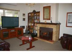 36 Mottram St Manjimup WA 6258 AND THERE’S MORE! Comfortable
home with high ceilings and lots, lots more. For instance do you fancy a
really big yard, one with an orchard and how about a separate gated
vegie yard. How about an entertainment den or a man cave big enough for a
snooker table, with a bar and a potbelly to keep you warm. There’s a
beautiful spot on the back verandah for a BBQ and for those summer
evenings you can entertain guests under the shade of a tree. Besides
3 bedrooms, there’s a large country kitchen with dining room and a
woodstove plus a separate lounge, a study and a very large laundry that
could easily take a second shower if you wanted to put one in. You will
find lots of other nooks and crannies both inside and outside to sit and
take a break. Small wood shed and garden tool shed out in the back
yard. This home is country living at its best and well worth a visit