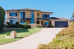 20 Clifton Gardens, KALLAROO 6025, WA **GRAND OPENING THIS SUNDAY 17th Aug 12.30 – 1.15pm**.. ……** FOR SALE
XPRESS: All offers presented Tues 26th August at 7pm**……..Set on an
expansive 1,012sqm block in a quiet cul-de-sac, this 5 bedroom, 2
bathroom plus study immaculately refurbished family home boasts
captivating Indian ocean views from the upstairs balcony.
Step inside to gorgeous marri floors via the double door entrance,
leading through to the generously sized home office that could be used
as a sixth bedroom. The expansive master suite is fit for a king and
queen and comes complete with WIR and stunning new bathroom complete
with stone bench tops and double basins, double shower with gorgeous
glass splashback and overhead rain shower.
Make your way through to the hub of the house with open plan
kitchen/dining/living overlooking the outside alfresco area. The gourmet
kitchen is sure to impress any budding master chef and features stone
bench tops, glass splashback, soft closing drawers with oodles of
cupboard space, top of the range appliances including a Miele dishwasher
and Technika stainless appliances including an in-built coffee maker.
Meander outside to the timber lined alfresco, massive pool with plenty
of space for the kids to play and gazebo area with barbecue. The kid’s
wing features 3 double bedrooms that are all bigger than many master
suites. All come complete with fitted out BIR with a second renovated
bathroom, again with stone bench tops, shower and bath with a unique
glass splashback featuring Where’s Wally and Nemo.
Upstairs you will fall in love with the theatre/games room with
fantastic bar/second kitchenette area with a gorgeous solid jarrah top, 4
integrated temperature controlled bar fridges, sink with hot and cold
water, built in shelves, glass splashback and theatre projector screen!
Featuring a guest bedroom upstairs with stunning views you simply can’t
go wrong! Ideally located in walking distance to St Marks Anglican
School, Whitfords shopping centre, Whitfords beach, the local Montague
Park with play equipment, Hillarys boat harbour and Mullaloo beach a 5
min drive and easy access to the Mitchell freeway you won’t be
disappointed.
Other features include
- Ducted reverse cycle air conditioning
- Neutral carpets and colours throughout
- Formal lounge and dining area
- Monitored Alarm system
- Huge double remote control garage with room for 2 cars and a jetski
- Reticulation throughout
- Room for parking boat/caravan
- Gas hot water system
- 4 bedrooms located downstairs with guest room upstairs
- Extra storage in roof