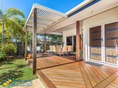 1 Baldwin Street REDCLIFFE QLD 4020 Across the road from the beach and only a short stroll to the cafe strip, transport and schools, this low-maintenance modern home is ready for you to move in - there's nothing more to do before you can start enjoying your dream beachside lifestyle. The open plan living and dining area opens out through stackable glass doors to the North-facing entertainer's deck, the perfect place for summer barbecues or a morning coffee in the winter sun. The kitchen offers well-thought out storage and all the features an entertainer could dream of, including gas stove, steam oven and warming oven.
