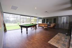 It’s not every day you come across such an impressive, architect
designed, large family oasis, all situated on 3.1 flat usable acres.
As you are welcomed by a circular drive entry your immediate attention
will focus on the semi glaze industrial sized windows which surround the
home with plenty style yet filter so much natural light throughout the
home.
Just to name a few features this property has to offer: 5 bedrooms PLUS
an office, several spacious living with vaulted ceilings, plus a glass
roofed sunroom, air conditioning and fireplaces and a central open
planned kitchen.
20x15m machinery shed with mezzanine storage and heavy lifting
capability. Car parking also extends to a separate 4 car shed.
An outside pool house/gym + covered BBQ area overlooking an in-ground
swimming pool.
Plus the property is also connected to town sewer and town water.
Sure to impress, contact our sales staff for a private inspection of
this home.