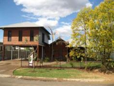 2 Quondong Street Kununurra WA 6743 The Seller describes this 4 bedroom, 2 bathroom property as an 'Argyle Townhouse', with loft inspired first floor is dedicated to a massive master suite which creates a true adult / personal / private / parent's retreat utilising the entire first floor area. Externally, a tasteful palette of mixed materials including steel and western red cedar cladding features show the attention to design undertaken by the builder. Internally, has been spared no differently with slate tiling, With external having a tasteful mixture of steel and cedar cladding, Merbau hardwood stairs, polished timber feature ceiling, lustrous cabinetry throughout. The two story design makes efficient use of the land size delivering an easy care lot with ample parking and outdoor entertaining spaces directly accessible from the indoor living areas. The list of features is endless 6m x 4m spacious master bedroom with separate WIR, quality stainless steel appliances in the kitchen including induction stove, rangehood, dishwasher, overhead cupboards and island bench, 40sqm Alfresco features built-in BBQ alcove, polished aggregate flooring, ceiling fans and lighting, panasonic split system air conditioning, louvered windows (with security bars downstairs) & downlights throughout, plenty of storage space, security on all entry doors, fully reticulated and fenced, storage shed, double carport. Offering an ultra stylish, modern and very unique style of Kimberley living.