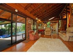 14 Bains Rd Currumbin Valley QLD 4223 Slice Of Heaven
Totally private 4.9 acres of lush rainforest with a 3-4 bedroom
brick & tile home offering slate tile floors and cathedral ceilings
to the living areas, combustion wood fire, bar with bench and sink, all
rooms enjoy spectacular views outside and the living area, dining area,
Master bedroom and 2nd bedroom all enjoy direct access through sliding
doors outside to the beautiful scenery and onto a full length undercover
veranda and a sparkling in-ground swimming pool plus outdoor
entertaining area. The Master bedroom is spacious and has a W.I.R plus
en-suite, there is plenty of storage, near new security screens have
been fitted throughout and there is also the possibility of converting a
huge void in the ceiling to an additional room. There is a veggie
fence, chook pen, feature garden rotunda, double carport (which would
possibly accommodate a small motor home), and a very handy rumpus room
separate to the house. Also offering a 4 bay garage, 2 x 20,000 litre
water tanks, bore water with a pump and a filter and solar hot water.
Enjoy one of the walking tracks and nature.
