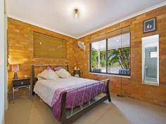 5 Fairhill Road Ninderry Qld 4561 This lowset brick home sits on 2023 sq m (1/2 acre) of level land. Located at Ninderry, the house has three bedrooms, main has a walk through wardrobe and access to the two way bathroom. Two steps up from the main entry takes you into the separate loungeroom. This area has timber floors, huge north facing windows and a feature is the port hole window at the front of the house. The family, dining and kitchen are combined and features tiled floors, a breakfast bar and electric cooking. The bathroom has recently been renovated and features a clawsfoot bath and pedestal basin. The home features brick feature walls, reverse cycle air conditioning, electricity returning to the grid, security screens and side access to the back yard. The family rooms opens out onto the outdoor entertaining area which is east facing and overlooks the lawn and tropical gardens at the rear. This home has tank water, septic system and electricity returning to the grid which all makes for cheaper living.