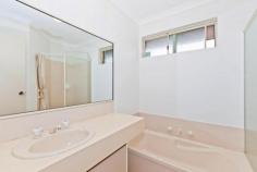 22 Pinnacles place Ballajura WA 6066 Tucked away in a quite cul de sac and only moments away from Schools/Child Care, Shops, Parks and Public Transport. This gorgeous 4x2 with study offers great family living with a floor plan that flows. After walking into this home you immediately get that warm feeling like you are home, walking into the family room. The main room is located at the front of the house, it is a great size with a walk in robe and ensuite. The Kitchen is very modern with its earthly colours, Top quality appliances, and also has a convenient breakfast bar that opens up onto the dining room. The kitchen looks out onto the Lounge. The minor rooms all have built in robes and are of decent size, the study is located between rooms 3 and 4. It has a window looking out onto the lounge. Not forgetting the advancement in technology with cable internet connection This is a great family home, where your many separate living areas can accommodate a growing family nicely