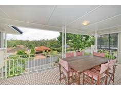 30 Nindethana Street Indooroopilly QLD 4068 PROPERTY FEATURES + This character filled 1960's double storey home is perched on the elevated high side of Nindethana Street, surrounded by prestige properties and captures the cool breezes and the fabulous leafy views. + A great family home offering an extra bonus providing a self contained unit with a separate entry, perfect for a teenager's retreat, guest accommodation or perhaps a second income rent it out. + Four generous bedrooms with built-in cupboards plus three bathrooms spread over two levels and a separate laundry. + Spacious open plan living and dining areas with polished hardwood floors, air-conditioning and an open fireplace. + Immaculate kitchen with an abundance of cupboard space. + The huge entertainer's balcony enjoys the views. + Internal stairs flow to the self contained unit plus a double lock up garage. + Quiet leafy street, good neighbourhood, flat backyard, 645m2 grounds child and pet friendly. + Water tanks, perfect north aspect. + Easy access to Indooroopilly shopping town, transport, Toowong Village, eateries, coffee shops, restaurants and the CBD. + This property offers many choices, live comfortable as is, renovate, or remove and build your dream home in this blue chip location of Indooroopilly.