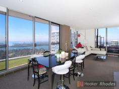 2304/87 Shoreline Drive Rhodes NSW 2138 This signature 3 Bedroom Apartment + Large Study (4th Bedroom) features a mouth dropping panoramic City + Water views from every room. Live everyday like a holiday in this what possibly is also the MOST PRESTIGIOUS apartment in Rhodes. Come & see this beauty today & express your interest before it is too late. We Love: 1) Uninterrupted City + Water Views from every room 2) 3 Massive Bedrooms + Large Bedroom Sized Study (Easily a 4th Bedroom) 3) 2 Car Spaces + Large Storage Room 4) Gigantic Wrap Around Balcony with Synthetic Turf (Artificial Grass) 5) Air Conditioning 6) 5 Years Developer Warranty Remaining 7) Total Area On Title is 280 SQM (BIGGEST Penthouse Apartment In Rhodes) Don't miss out on this unprecedented property as it won't come around again. INSPECT NOW BEFORE IT'S TOO LATE!