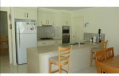 23 Jimilee Street Dundowran Beach This immaculate 3 year old home sits high and dry on a 2237m2 elevated
allotment and walking distance to the Beach.The home features 4 Built-in
bedrooms, Formal Entry, Separate Living Room and Family Room both Air
Conditioned, spacious Dining room, stylish Kitchen complete with
Stainless Steel appliances, Gas Cook top, Dishwasher and Walk-in Pantry.
Both the Bathroom and Ensuite feature extensive tiling finished off
with stylish features and trims.The Family room opens onto a large under
roof Patio which leads onto lawns and gardens. There is also a North
facing front Verandah where you can sit and enjoy those fresh Sea
breezes. The house includes a double lock up Garage as well as a 6.2m x
7.7 fully lined shed complete with work bench and its own concrete
driveway. The block is fully accessible by vehicles and has been fully
turfed.