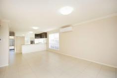 1/12a Kite Street Rangeville Qld 4350 This is ideal for those looking for the sophisticated lifestyle without comprising on location! Featuring: * Brand new duplex. Elevated position * Modern open plan with Northern aspect * Stylish kitchen. Stone bench tops. * Quality stainless steel appliances. * 2 bedrooms, both with built ins * 1 bathroom. Separate toilet * Covered outdoor area to the North * Single lock up garage. * Turn key finish. No Body Corp * Walk to parks, shops, schools & public transport. It is all about location & lifestyle!