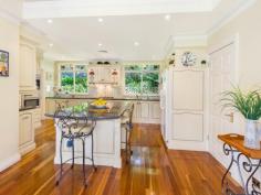 11 Carson Street Pymble NSW 2073 Ideally set in the Pymble exclusive east side "Golden Triangle" dress circle, cul-de-sac setting, just a 650m stroll to rail and village. One of Pymble's esteemed estates, this prized full brick residence, offers the perfect combination of grand scale living and entertaining. Privately positioned amid North facing landscaped grounds of 2737sqm, with approved subdivision for 2 titles. Capturing panoramic botanical views this family home has classical inspired interiors, offering a choice of living zones flowing to outdoor spaces.