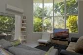 1/39 Duke Street Stuart Park NT 0820 Featuring 14ft ceilings in the main living room and higher than average ceilings throughout the rest of the split-level property, this unit provides a beautiful living environment for anyone with a need for space, but looking for city-fringe convenience. Grand cathedral windows in the lounge and main bedroom overlook a private tropical garden setting. The master bedroom is spacious with built in robes and a large en suite bathroom while the second bedroom has access to its own private balcony overlooking the lawn and side garden. The main bathroom comprises of bath, shower and vanity unit and the unit has a large indoor laundry/utility room. The spacious front balcony can be accessed from the living area or from your own private entrance. The secluded unit located on the ground floor in a complex of only 13 has two secure car parks. If you are looking for something different, this spacious, airy unique home might just be the one for you!