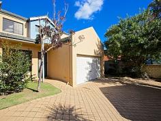 Unit 7- 61 Colin Road Scarborough, WA 6019 Executive Townhouse superbly located in South Scarborough. Just a stroll to parklands and the beach. North facing for loads of sunshine this end townhouse is light and bright. Timber floors to living area, tiled dining and luxury kitchen, Split reverse cycle air conditioning, timber blinds. Walk outside to huge grassed private courtyard with room for a pool. Upstairs features 3 Generous Bedrooms,2 Bathrooms and air conditioned master. All freshly painted and well maintained by excellent tenants paying $550pw until March next year. Double Garage and storeroom. This complex is well maintained with lush garden surrounds.Close to the beach,shops and easy City access make this a superb buy! Act today call me to inspect