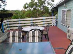 22 Ashton Street Macleay Island Qld 4184 Situated in a quiet Street this lovely home is kept private from the road with established large shrubs at the front of the property. It is fully fenced with 6 ft fences at the back of the lovely yard that has beautiful massive palms among the gardens. Enjoy summer with your fenced swimming pool and barbecue on the huge decks on the side and back of the home. Downstairs is perfect if you wish to work from home, with an office set up in one of the rooms and another room free as a 3rd bedroom. The two bedrooms upstairs have fans and wall heaters as well as built in wardrobes. The home has raked high ceilings for an extra feeling of space. There is a bathtub and separate toilet, and the kitchen is modern and spacious. There is air conditioning in the main living area which has screen doors out on to the deck. There is also a double carport and garden sheds. A lovely home, close to the jetty and shops. The vendor would love to rent back the home after sale, so you have a built in tenant if you want one.