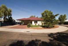 6 Tamarind Meander Kununurra WA 6743 Only 5 years young is this massive 4 bedroom, 2 bathroom colourbond home has room to move and relax with a theatre and additional 5th bed/store/office. This property is available NOW for owner occupiers to take advantage of a rare opportunity to snap up a great sized family home before lease negotiations begin. Featuring huge open plan living area including dining, lounge and well-appointed kitchen. The spacious and very functional kitchen features stainless steel appliances, dishwasher, good sized walk-in pantry with sectioned shelving and plenty of cupboard space – just perfect for the budding chef. The home has been designed with space in mind with larger than average sized rooms featuring built in robes with the master featuring walk-in robe and functional ensuite. The paved outdoor entertaining area is surrounded by attractive gardens. Double carport parking with additional parking for a boat/caravan and side access through to the rear. Other property inclusions are tiled flooring throughout, split system air conditioners, venetian blinds, security on entry doors and warm neutral colour scheme throughout. This property has the potential to achieve returns of over 7% and has been a strong investment since its completion in 2009.