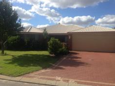 6 Barnett Close Huntingdale WA 6110 4 Bedrooms 2 Bathrooms Comprising of:- King Size Master Bedroom Wooden Floors, Walk In Robe & Shower En-Suite 3 Double Family Bedrooms 2 with Robes Family Bath / Shower Room Large Formal Lounge Spacious Open Plan Kitchen, Family, Games Room Ducted Air Conditioning Laundry with Walk in Closet and Built in Cupboards Patio Entertaining Area Rear Lawned Gardens Remote Lock Up Double Garage Large 700sqm Block in Quiet Cul-de-sac Location call Allan Rowland on 0439 516 399
