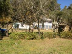 5653 Bruxner Casino NSW 2470 Just 28 kms west of Casino sits this great investment comprising of TWO
HOMES one ofthe homes is a 3 bedroom weather board and iron roof the
other is an attached 2 bedroom self contained unit both very well
watered by fresh rain water tanks plus a bore this property is situated
on a great small flood free acerage of 2579 sq meters handy to the
Mummulgum Village and the township of Casino with School bus past the
front door