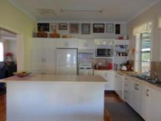 36 Sunnyside Road Moree NSW 2400 Sunnyside Treasure!! *Beautiful 2 bedroom home with sleep-out *Both bedrooms have built in wardrobes *Good size sleep-out with built in wardrobes *Spacious lounge room with split system air conditioning *Dining area with tile fire place *Large modern kitchen with adjacent meals area *Central main bathroom with shower over spa bath, vanity, toilet & linen cupboard *Laundry adjacent to sitting room *Generous back deck overlooking the grounds - perfect for outdoor loving *Evaporative air conditioning *Double lock up garage with workshop *Beautifully maintained lawns and gardens with automatic watering system in place *Situated on a 3387 square metre block
