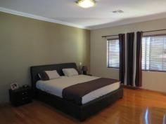 4 Wexford Meander landsdale WA 6065. Have you been dreaming about living in style in a custom designed split
level home, Well this home is for you, 4 Double bedrooms all with built
in robes, master bedroom with spa plus study (this room could be used as
another bedroom) 3 bathrooms, 4 wc's, ducted air conditioning, ducted
vaccum cleaning system, huge games room, theatre room, huge granite chef
kitchen, beautiful alfresco area with below ground pool, timber
flooring throughout the house and much more.