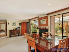 1171 Bundarra road, Armidale Welcome to 'Arrakis', this established rural retreat is hidden from the world by it's fabulous parklike gardens. On offer is approx. 22 acres of slightly undulating land with an abundance of water and an opportunity for the successful purchaser to relax in the delight of it's manicured parklike gardens. You are welcomed to the 4 bedroom brick residence by a fabulous North facing timber deck that is large enough to entertain in privacy whilst marvelling at the established trees, garden beds and paths leading you right through the house yard with separate areas to relax including a paved pergola area. The residence has a modern feel with large living areas, wood heating, great Northern aspect and updated kitchen and bathrooms. All 4 bedrooms are of generous size, all have built in robes, the main with spacious WIR, uniquely different ensuite and private access to another Northern deck. There is a separate studio off the main dwelling and is fully lined. Storage isn't an issue with ample linen cupboards, SLUG as well as a 2bay plus workshop colourbond shed which is 6mx9m, fully powered and concrete floor. The 22 acres is divided into 6 paddocks, has excellent holding yards with loading race, 2 large dams, plus approx. 45,000 of tank storage and creek frontage on the Western boundary. Also, for the horse enthusiast, 3 stables with power in great order and a ready made dressage arena. There are numerous other out buildings, vegie patch and loads of opportunity for the successful purchaser. Don't delay, organise your inspection today, contact Michael Singleton on 0434714788 as this property will not last.