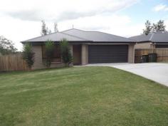 2 Monza Street Beaudesert QLD 4285 Nestled in a quiet area just 4km from everything (School, Hospital, Golf Club - the important stuff); this well presented property boasts approximately 195sqm of house, providing plenty of room for the entire family. With 4 bedrooms, separation of living and 2 bathrooms this 2 year old property has everything you could possibly want, including side access for those bigger toys!