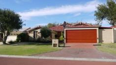 12 Taroona Lane Currambine WA 6028 Well established, renovated home comprising 4 bedrooms 2 bathrooms, shoppers
entrance into mud room (ideal for storage or study), separate activity room to
children's zone, lounge/dining room, open plan meals / living area and
beautifully renovated chef's kitchen with engineered stone bench tops and
breakfast bar,under mount double sinks, 900mm gas cook top, range hood, Bosch
dishwasher, walk in pantry and double fridge recess with water tap. Walk
out to a large pitch roof patio and fully fence below ground salt water
fiberglass pool with spa jets, established reticulated gardens and lawn
area. Extra features include: - 2.3KW (with 3KW inverter) solar
panels - 3 reverse cycle split system air conditioners - engineered black
butt timber flooring throughout (no carpets) - BIR's - ample storage to
laundry with overhead and under bench cupboards - double enclosed carpet with
auto door and extra covered storage area - new gutters and recent new gas
storage hot water system - gas point to lounge Great location close to
Currambine Shopping Centre, cinemas, new restaurants/cafes, easy access to
transport and freeway, 5 minutes drive to Joondalup City, beaches and lake.