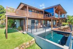 Whitsunday Blvd Whitsunday Islands National Park, Hamilton Island QLD 4803 This stunning low maintenance property features outstanding 180 degree sea and island views, overlooking Whitsunday Island to the east, through to Whitsunday Passage and South Molle Island to the west. The property also features a 5 bedroom, 3.5 bathroom house designed by Chris Beckingham, is fully furnished & air-conditioned, with in ground wet edge pool and spacious verandahs and patios ideal for entertaining, all surrounded by landscaped tropical gardens and established quality properties