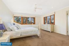 26 Bavin Street, CURTIN ACT 2605 Elevated within a dress circle location, this contemporary design amalgamates modern & rustic finishes, complementing light filled living spaces to create a family home for the avid entertainer. In a much sought-after location, this home offers panoramic views of Woden Valley & the Inner South combined with a location backing nature reserve & walking trials. The commanding facade gives way to the formal entrance, extending right through to the covered alfresco dining area. Opulent hardwood floors combine with high ceilings & full-length windows to create a warm & spacious family atmosphere. French doors lead into the front terrace complete with automatic & rain sensitive Vergola, making the formal lounge perfect for entertaining guests while admiring the breathtaking outlook by the slow combustion fireplace. The light-filled family room creates the central hub of the home, adjoining the dining, kitchen, home theatre room & alfresco area to create a lavish space while entertaining. The designer kitchen creates a true French provincial feeling that resonates throughout, with granite bench tops & splashbacks, country-style cabinetry, stainless steel appliances by Bosch & integrated rangehood with an oversized island bench. The jewel of the home, however, is the alfresco lounge, integrating a built-in BBQ set around the pond water feature leading to the covered dining & lounge area. The vast inground swimming pool is solar heated & features a modern ionised automatic cleaning system and is perfectly complemented by the pool house, offering extra storage for pool equipment & garden tools. Backing the reserve, this entertaining space also gives immediate access to open parkland & walking trails. Upstairs, the main study separates the substantial main bedroom suite from the other bedrooms, incorporating an enormous ensuite, complete with bath for that extra relaxation & a spacious walk-in robe. Bedrooms 2 & 3 are also upstairs offering enormous built-in robes while capturing the astonishing views that are on offer. The 2 additional bedrooms downstairs offer the perfect setup for a purposely designed study & a guest bedroom, or just that extra space that you have been looking for. The bathrooms incorporate a true French provincial feeling with hardwood timber cabinetry & classic French-style tapware; evidence of the unique design. The basement & cellar area create a perfect space for segregating teenagers or kids at heart. This sublime space, perfect as a games room & spaciously designed to fit a full sized snooker table & then some, leads into the purpose-built cellar, completed with its own microclimate. The 30m2 garage allows extra storage space for the home & combines with the carport for extra off street parking. Positioned in this beautiful elevated location, the proximity to a variety of lifestyle choices is better than most. The local Curtin shops house restaurants & cafes in abundance, & this home offers easy access to the larger Woden shopping hub & the city's centre. Be sure to inspect this rare offering to the market, a home to enjoy with your family & friends for years to come.