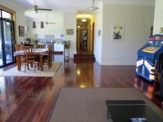 Semi-rural lifestyle with city convenience.!! Park-like, spacious,
useable grounds with fruit trees, natural bush and extensive parking .
900m approx to city train service, restaurant, antique shops, post
office, general store, community hall and mechanic, parks, tennis courts
and sporting oval. Walk to highly regarded, child care, public primary school or private school. 3km approx. to a choice of busy shopping centres, pubs and cafes.
Extensive bushland walks or mountain bike trails located at the end of
the street. Shared bicycle / pedestrian path at the front gate.
Executive style, contemporary home, built for a modern, successful
lifestyle with views, space and privacy. Frank Lloyd Wright inspired,
this architect designed 7 yr. old home has the ‘wow’ factor – with
vistas, light and open plan living, combined with the huge bedrooms,
ensuite, robes, extensive storage and those other modern essentials that
make this home a must see. Featuring Jarrah floors, high ceilings,
super wide eaves, outdoor speakers, tinted windows, paved courtyard,
underground water tank, under-house storage, sensor lighting and outdoor
power outlets. The list goes on and on. Energy efficient,
insulated and low maintenance, the home was built to stringent bushfire
and environmental standards. Natural gas heating and cooking, vogue
style kitchen, high speed internet and underground 3 phase power service
the home, while data and multiple digital TV aerial points abound (
including all four bedrooms.) Entry to the property is via a gated
driveway, lined with established native lilli pillis. There are multiple
parking areas, plus services available at the swimming pool for the
visiting caravan or motorhome.