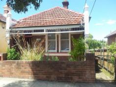 20 Morris St Summer Hill NSW 2130 Ideal For Development- 4 bedroom and Large Lounge Take full advantage of this rare and extraordinary opportunity in securing this affordable property. Here is your chance to get creative with this appealing 4 bedroom, large lounge, free standing house which is positioned in the very best street of Summer Hill. It exudes period charm with original fireplaces, ornate ceilings and cornices, polished timber floors and a lounge/living area. The bathroom features bathtub with shower, toilet and vanity. A private rear yard with open space and wild life views, includes a garden shed and external laundry and extra external toilet plus under floor storage. Just a few minutes walk to the end of the street and you are in the Summer Hill village shopping area with access to an array of fashionable restaurants, supermarket and shops and a further half a minute from there and you are at the Summer Hill railway station and buses. The area boasts parks, sporting grounds, public and private schools and is close to Leichhardt, Marrickville and Ashfield which are its surrounding suburbs. Comparing this property to other properties sold in the area you will find this location much more preferable and much better value for money. Properties such as in Wellesley Street Summer Hill, which sold in April 2010 for $1,475,000 with similar accommodation but is further from the railway station and backs onto busy Old Canterbury Road which is becoming polluted with the increased car fumes. Also comparing with a December 2013 sale in Bartlett Street Summer Hill, which is not as popular a street as is Morris Street, that sold for $1,235,000 offering 3 bedrooms on a smaller block and being a semidetached property and does not give the opportunity for future additional storey to be added which can be done with 20 Morris Street thus giving a possible additional income as an investment rental property. Perhaps you have not noticed 38 Morris Street which sold in November 2011 for $1,360,000 and again in November 2013 for $1,870,000 this shows the value you can achieve in this sought after Street. Also a few doors down the street the house at 10 Morris Street has previously been occupied by 3 doctors as a surgery which shows the possibility of commercial use in a residential property for this street. In regard to 20 Morris Street that stands on a higher ground than the surrounding streets and offers a better circulation of air. The magnificent area outlook from the rear windows of the property gives a very nice feeling that you are in the very best spot in Summer Hill. The owner is willing to have builders repaint and change the kitchen to the purchasers requirements and or what ever is required prior to settlement. A current approximate rental return of $950 per week and a great possibility for a second storey extension, subject to council approval, which could generate a further rental return. This shows location and value stands out for this property meaning you can buy this house and you will never look back.