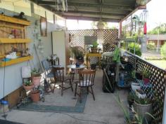 Tivoli, QLD, 4305 - Walkers Real Estate Good central location within a few minutes by vehicle to highway,
Riverlink shopping complex. Handy to Primary schools. Bus transport
available at door. Dwelling features 2 bedrooms, master with built-ins,
formal lounge, spacious kitchen with dining attached, large carport,
outdoor BBQ/recreation area. No flood. Space for a shed or pool. 818m2
allotment