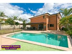 60 Bunker Road, Victoria Point QLD 4165 This insulated huge brick family home will surprise you. There is tons of space for everyone to spread out. With large formal lounge dining room, separate media room, separate study, powder room and open plan kitchen/family/dining leading out through sliding glass doors to a good sized undercover entertainment area, which overlooks the sparkling inground pool and there’s plenty of yard still for kids to play. Upstairs you have a TV room, massive master ensuite with huge walk in robe, a second bedroom with ensuite and the third and fourth bedrooms have a two way bathroom joining them, so everybody is sorted. There is double gate access to one side of the house providng plenty of space for the caravan and also gated side access to the other side of the house which leads through to the back yard, so plenty or foom for all your vehicles. Located so close to the shops, restaurants, cinema, doctors and walking distance to schools all the family will benefit from living here.