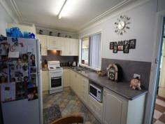 162 Macqueen Street Aberdeen NSW 2336 A Spacious Package This home doesn't look huge from the street but with it's massive QLD room off the back you will find plenty of space. There is a loungeroom at the front of the home with ceiling fan and R/C A/C. A new kitchen with attached dining area plus three bedrooms, the main with a fan and built in robes. The bathroom has been refurbished and there is a separate toilet. The QLD room runs the full length of the home and has roll down blinds for shade. At one end is a portable Spa which the current owners love but are willing to leave at the property for the next person to enjoy. Off the back of the home is a deck area overlooking the fenced yard, there is also a BBQ area. With double off street parking, side access and a single carport and large shed with power this home has the lot. At this price look no further!