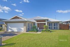 123 Shutehaven Circuit Bushland Beach QLD 4818 Seachange Lifestyle - At Its Best! The superior quality of this very desirable home is immediately evident when entering through the double feature front doors framed by an attractive raised portico. Built to exacting standards by a leading Townsville firm, the quality of finish and standard of appointments will impress discerning buyers and the functionality will suit a variety of lifestyles from professional couples to larger families. The bedrooms are all generously proportioned and the master bedroom features a substantial ensuite including bath, separate shower, double vanity and walk-in robe. Having direct access to the patio and spa, it is a perfect retreat, nestled privately at the rear of the home. Living areas are open, bright and airy and blend seamlessly with the outdoors creating a vast and appealing entertaining area. A second living room doubles perfectly as a home theatre and overlooks fully maintained parkland directly across the road. The yard is low maintenance and has side access to accommodate a boat or trailer. This is a must see for buyers searching for an immaculately presented home in a sought after location with only 2 neighbours. The Property - Immaculately presented and very functional layout - Expansive open plan design with numerous appealing features - 2700mm high ceilings throughout - Master bedroom includes substantial ensuite with double vanity, separate bath, shower, separate toilet and sizable walk-in robe - Double size patio with large heated spa - Fully air-conditioned with quality brand invertor split system units - Art niches to entry, living and dining rooms are elegant additions - Chef’s kitchen with extra wide fridge space, and servery to family room - Plenty of storage - double linen cupboards and built-it cupboards to garage - Side access for boat/trailer parking The Location - Located in the high growth Northern corridor in a very desirable part of Bushland Beach surrounded by other quality properties - Premium aspect maximises cooling sea breezes, afternoon shade and park outlook - Only 2 neighbours and directly opposite fully maintained parkland - Minutes to the beach and local tavern - Close proximity to local supermarket, shops and fast food - Close proximity to child care facilities