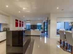 8 Morell Street MORNINGTON, VIC Exceptional design, quality inclusions and quiet cul-de-sac positioning less than 100m from beautiful Mills Beach and the famous Esplanade. In Mornington exclusivity stands this near-new, double-storey residence offering four large bedrooms, three separate living zones, a powder room, central bathroom and front study/office. The master bedroom opens to a private balcony and features an opulent twin-vanity ensuite plus dressing room with sliding mirrored robes. This is boutique living only steps from Tanti Creek and within handy walking distance to Main Street conveniences and an opportunity to experience an enviable holiday lifestyle on a professionally landscaped 620sqm allotment (approx.). -Bay glimpse -Expansive stone-topped kitchen -Chef's oven -In-built microwave -Integrated dishwasher -Double sink -Walk-in pantry -Five-star energy rating -Structural guarantee -Air-conditioning -Gas ducted heating -Gas-assisted hot water -Plush Mocha carpeting -Downlighting -Porcelain tiling -Soaring high ceilings -Camera/alarm system -Mains gas for BBQ -New fencing -Covered alfresco entertaining -Double garage with internal entry