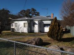 11 Belwood Street, Stanthorpe Located near Mt Marley in a quiet area of town, this rendered home is
set on solid stumps, and has an open fireplace in the lounge, dining
area, 2 bedrooms plus good size sleepout (or 3rd bedroom), kitchen with a
gas stove, bathroom, laundry and a separate garage with a store room.
The land is larger than normal with an area of 1,361sqm and is fenced.
For sale at only $165,000neg.