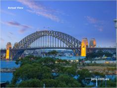 12/2 Pearson St Balmain East NSW 2041 ith spectacular 180-degree views of the harbour, the harbour bridge,
Barrangaroo parkland and the city skyline, this superbly renovated
apartment is on the first level of Midships, a boutique low-rise complex
set amid gracious period homes in a quiet tree-lined avenue at the tip
of Balmain East peninsular.
Ideally located, the building is footsteps from the harbour foreshore,
expansive tracts of parkland and Balmain East ferry and CBD buses, as
well as a short walk from village shops and cafes on Darling Street
Architecturally redesigned with premium quality fixtures and finishes
throughout including Tallowwood floors, integrated cabinetry and
bookshelves
Central entrance hall flows to light-filled living and dining zone with
wide picture window and glass door opening to private and sunny view
balcony
Sleek Quantum Quartz gas kitchen with abundant storage (including self
closing drawers), Liebherr integrated fridge and NEFF appliances
including four-burner gas cooktop, electric oven (with slide away door
and steamer), rangehood and integrated dishwasher
Main bedroom with generous custom-built-in wardrobe, designer
single-blade ceiling fan, bespoke curtains and glass door opening to
view balcony
Second double bedroom with built-in wardrobe, custom fitted shoe cupboard and Roman blind
Chic and spacious Carrara marble bathroom with big shower, heated towel rail and concealed laundry with linen storage