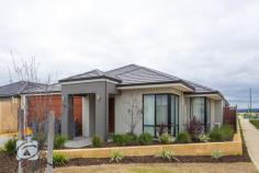 16 Emanuele Bend Harrisdale WA 6112 SHOW HOME LOOKS Situated in the desirable Newhaven Estate, this outstanding home offers modern living spaces on a manageable block. Featuring 3 generously sized bedrooms and a study, you will feel a definite sense of space. Less then two years old, this Ventura built home will suit anyone with its modern layout and quality finishes. Features include: *3 Good sized bedrooms with carpet, master has his and her walk in robes, minor bedrooms have built in robes *2 Bathrooms - Ensuite with shower, glass shower screen and double sink vanity. Bathroom with shower, vanity and bath *Stunning modern kitchen - complete with stainless steel double sink, gloss black cupboards, 900mm Gas cook top and electric oven, flumed range hood, overhead cupboards and double fridge recess *Carpeted theatre room *Quality flooring throughout - tiles and floating floor boards *Split system reverse cycle air conditioning to master and living *Large laundry with ample cupboard space *Spacious alfresco area under the main roof *Stunning double door entrance with portico *Neat and tidy low maintenance reticulated gardens *Double enclosed garage with direct entrance into the house *Close to all amenities including Schools (Carey Baptist College and Piara Waters Primary + planned High School), Shopping Centres, Transport links, Parks, Lakes and much more