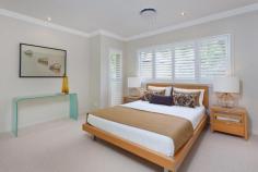Celebrity House Carrara QLD 4211 North facing riverfront home Lagoon pool Expansive sun-drenched riverfront terraces Full size floodlit tennis court New pontoon for 50 ft boat with 240 volt power Security cameras and sensor lights around property Fully automated irrigation system and garden & tree lighting Separate 2 bedroom guest residence Large modern kitchen with Miele appliances